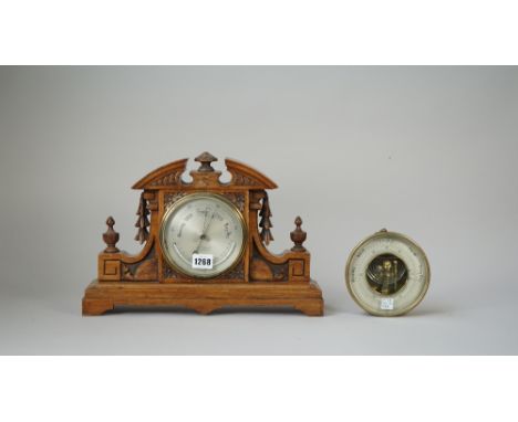 A barometer/thermometer compendium by J.B. Dancer, Manchester, the 5 inch drum housed in a carved oak case and another brass 