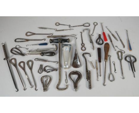 A collection of button hooks, mainly white metal or chromed. (qty)