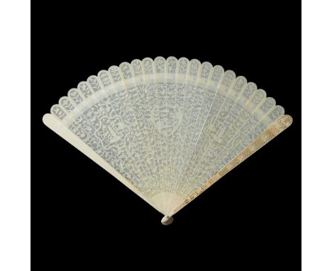 A Cantonese ivory fan, 19th century, foliate carved and pierced decoration with central shield depicting a Chinese landscape 