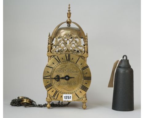 A brass lantern clock, the 6.5inch dial detailed Thomas Moore Ipswich, 37cm high (brass cased lead pendulum and one cast iron