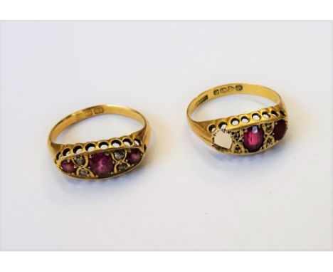 An 18ct gold, ruby and diamond ring, mounted with three rubies, alternating with two pairs of cushion shaped diamonds, Birmin