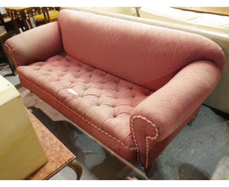 A late Victorian mahogany framed Chesterfield style sofa with pink button back upholstery, 195cm wide. 