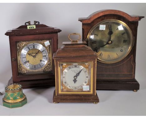A group of four late 19th/ early 20th century mantel clocks.