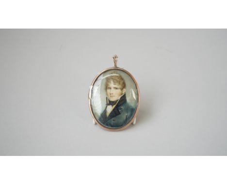 Samuel Shelley (1750-1808), portrait miniature on ivory of a young man, blue grey coat with black lapels, yellow lining, pape