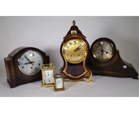 A 20th century carriage clock, another smaller and three 20th century mantel clocks, (5).