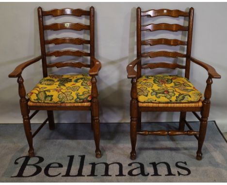 A pair of 18th century style oak ladder back open armchairs, (2).