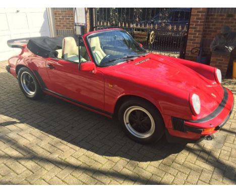 A 1985 Porsche 911 Carrera cabriolet, registration number C725 DHY, Guards red. The final incarnation of the iconic 911 becam