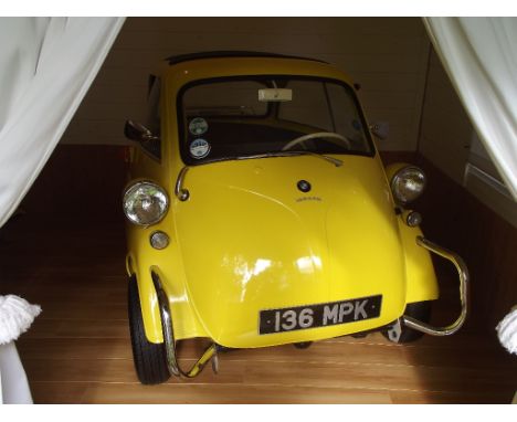 A 1960 BMW Isetta 300, registration number 136 MPK, yellow. Built under license by BMW the Italian Iso designed micro car fea