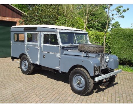 A rare 1957 Land Rover Series I 107 inch station wagon, registration number YFO 361, chassis number 131-8-00025, blue. The 10