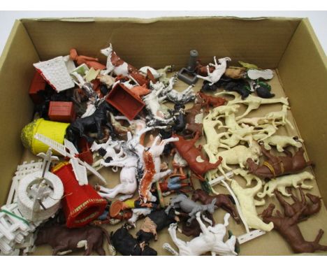 A collection of vintage plastic zoo and farm animals and accessories