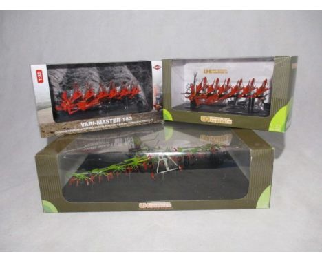 Two boxed Universal Hobbies Country Collection die-cast farm machinery models including a Claas Volto 1320 Swather &amp; Kuhn