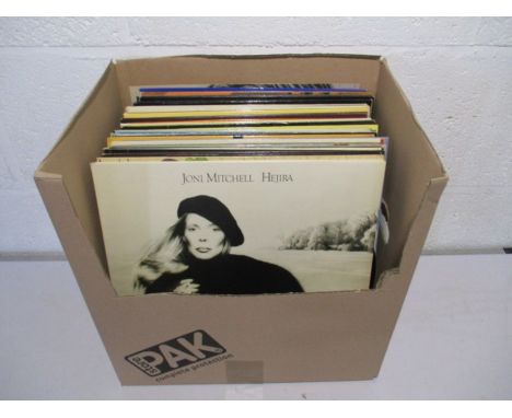 A collection of 12" vinyl records including Bob Dylan, Bruce Springsteen,  Fleetwood Mac, Elton John, Joni Mitchell, Donovan,