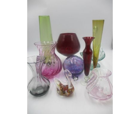 An assortment of vintage coloured glass. 