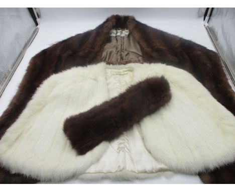  A vintage fur wrap, a fur evening shawl plus a stole.  