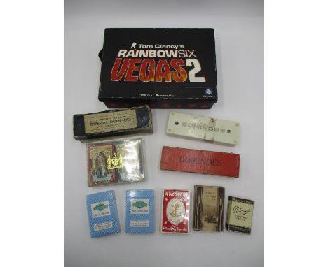 A Tom Clancy's Rainbow Six Vegas 2 poker set, along with three vintage sets of Dominoes and selection of playing cards