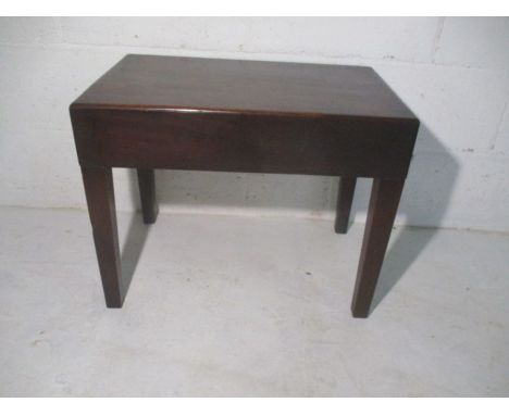 A Georgian mahogany commode  