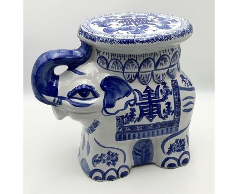 A Chinese style blue and white pottery plant stand/stool in the form of an elephant 