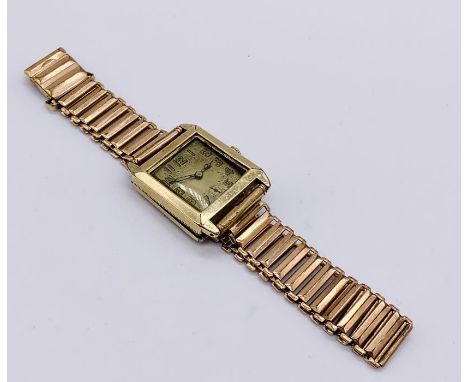 A tested 14ct gold vintage Lorie wristwatch on gold plated strap