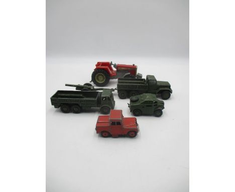 A collection of vintage die cast including a Dinky field artillery tractor, Ten ton army truck, red land rover and Howitzer, 