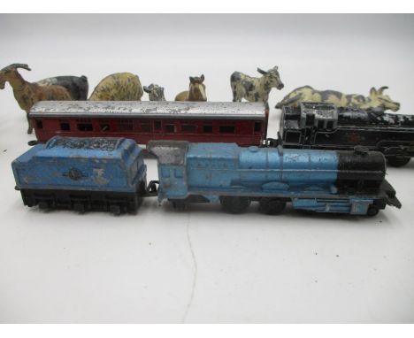 A small assortment of vintage lead toys, trains, planes, figures and animals.