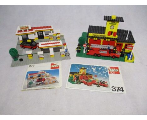 Two sets of vintage Lego including the Shell Service Station (377) and Town Fire Station (374) - both with instructions, unch
