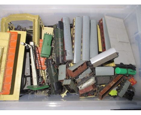 A large quantity of vintage play worn model railway including the Duchess of Montrose and a SNCF locomotives, rolling stock, 