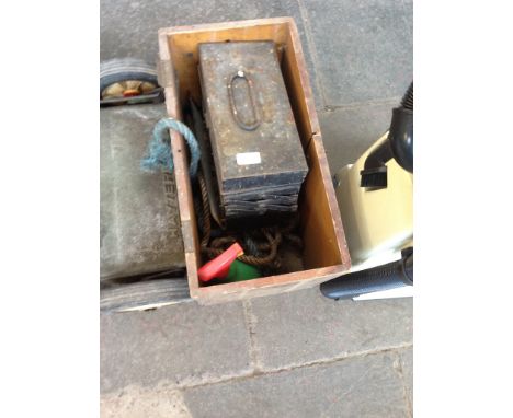 A WOODEN BOX OF TOOLS