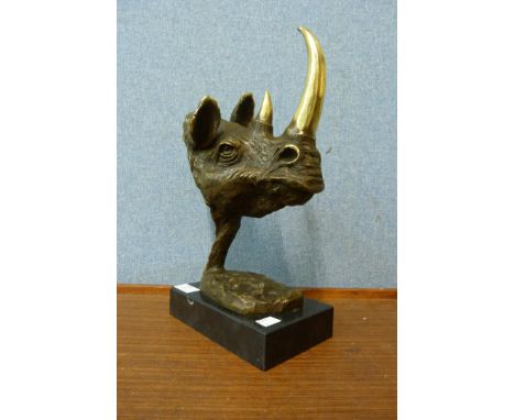 A bronze figure of a rhino head, after Salvador Dali 