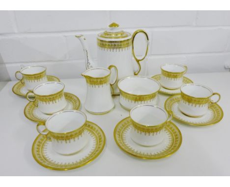 A Royal Albert porcelain white glazed and gilded edge coffee set comprising, coffee pot, cream jug, sugar bowl, six cups, six