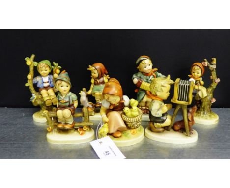 A collection of six Hummel figures together with another similar (7) 