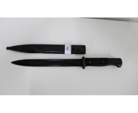 German K98 bayonet with steel handle and scabbard conforming numbers 3502 to both and marked WKC  43m long 