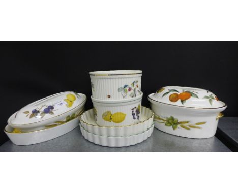 A collection of Royal Worcester Evesham pattern oven-to-table wares to include flan dishes and covered serving dishes (8) 