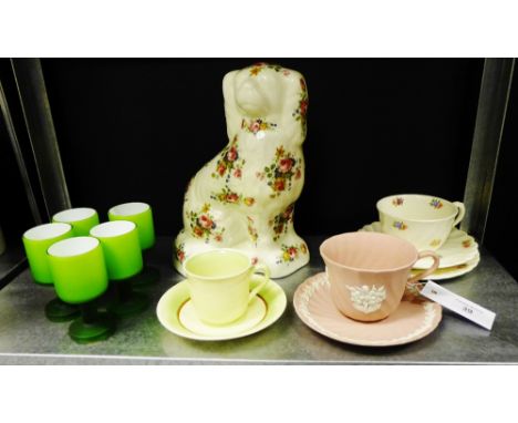A mixed lot to include two Clarice Cliff cabinet cups and saucers a Wedgwood Pink Jasper cup and saucer a floral decorated sp
