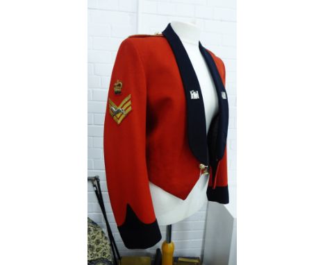 5th Inniskilling Dragoon Guards uniform comprising red jacket with black lapels having Sergeant stripes to sleeves and white 