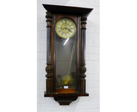 A mahogany case Vienna style wall clock