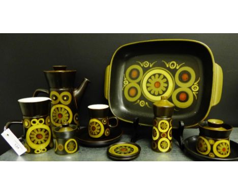 A Denby Arabesque brown glazed dinner service comprising eight dinner plates, nine side plates, eight bowls, eight saucers, e