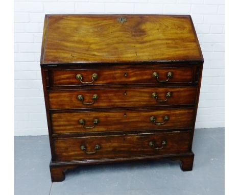 A 19th century mahogany bureau, the fall front opening to reveal a fitted interior and brown leather skiver with pull out sli