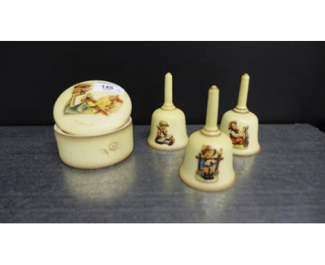 A Hummel bookworm jar and cover together with three Hummel bells, complete with boxes (4) 