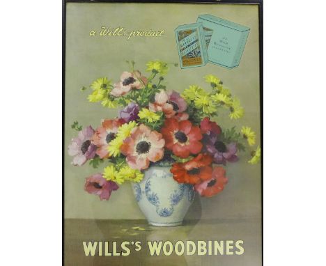 A vintage Wills S Woodbines advertising print in a glazed frame  50cm x 70cm overall 