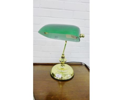 A brass and green glass student's lamp