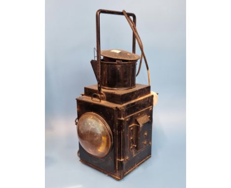 A BRITISH RAIL LANTERN WITH TWO WINDOWS OF CLEAR MAGNIFYING GLASS, NOW WITH AN ELECTRIC LIGHT SOCKET