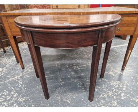 A GEORGE III MAHOGANY DEMILUNE TEA TABLE OPENING ON A SINGLE GATE, THE SQUARE SECTIONED LEGS CHANNELLED. W 89 D 89 H 74 cm