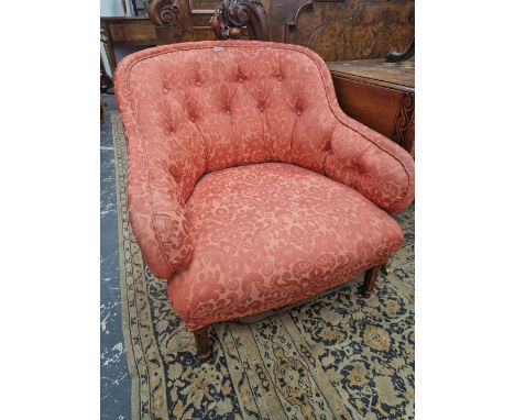 A MAHOGANY ARMCHAIR, THE ROUNDED BACK BUTTON UPHOLSTERED IN TERRACOTTA DAMASK. W 77 D 84 H 89 cm