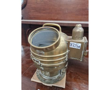 A BRASS MOUNTED SHIPS BINNACLE COMPASS WITH OIL POWERED LIGHT