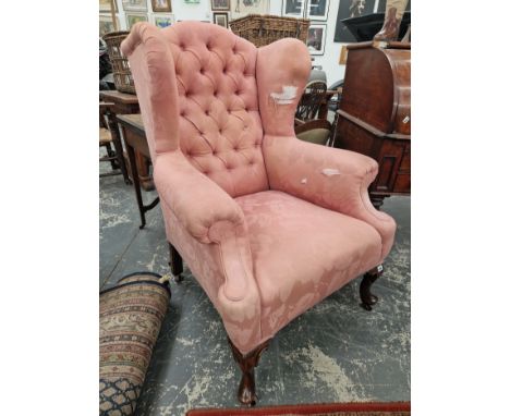 A MAHOGANY WING BACK ARMCHAIR BUTTON UPHOLSTERED IN PINK