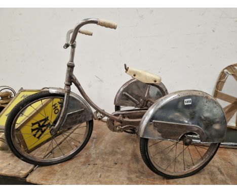 A RETRO CHILDS TRICYCLE.