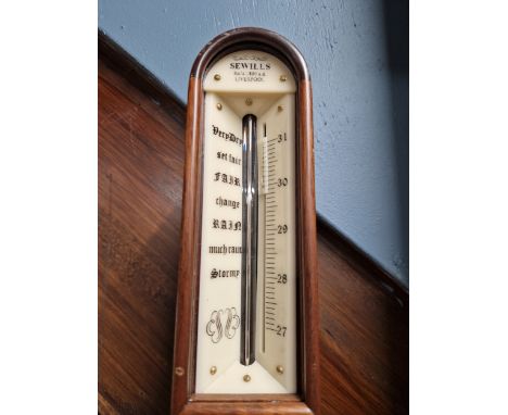 A MAHOGANY SHIPS STICK BAROMETER BY S E WILLS OF LIVERPOOL, THE DIAL ABOVE AND BLUE ALCOHOL THERMOMETER AND BRASS MERCURY RES