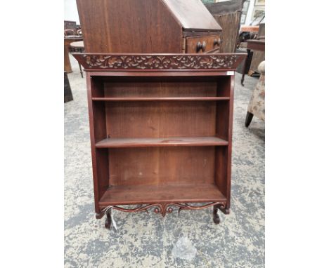 AN ANTIQUE MAHOGANY WALL SHELF WITH PIERCED CREST.