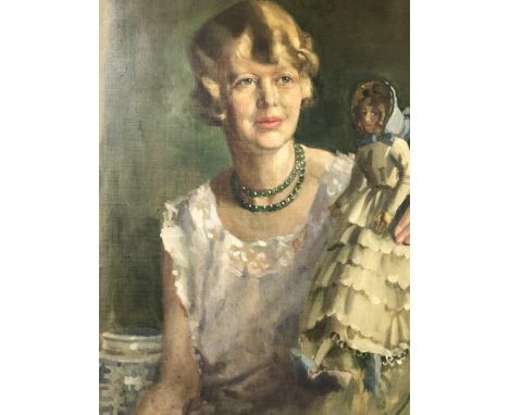 DOUGLAS GRANVILLE CHANDOR (1897-1953) PORTRAIT OF A LADY WITH HER DOLL. OIL ON CANVAS SIGNED L/R DATED 1925. 70 X 90 cm OVAL.