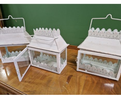 A COLLECTION OF MODERN METAL GLAZED TEA LIGHT HANGING LANTERNS